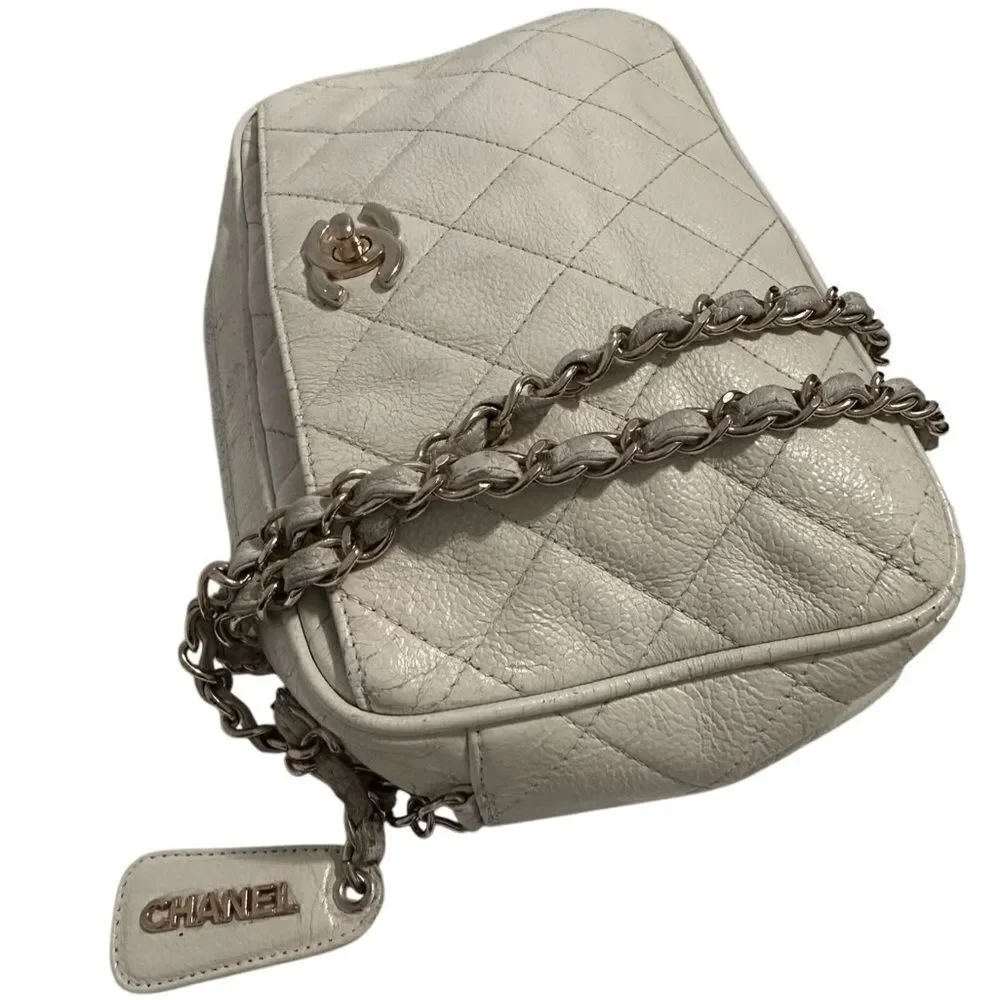 Chanel beige quilted gold tone leather crossbody bag